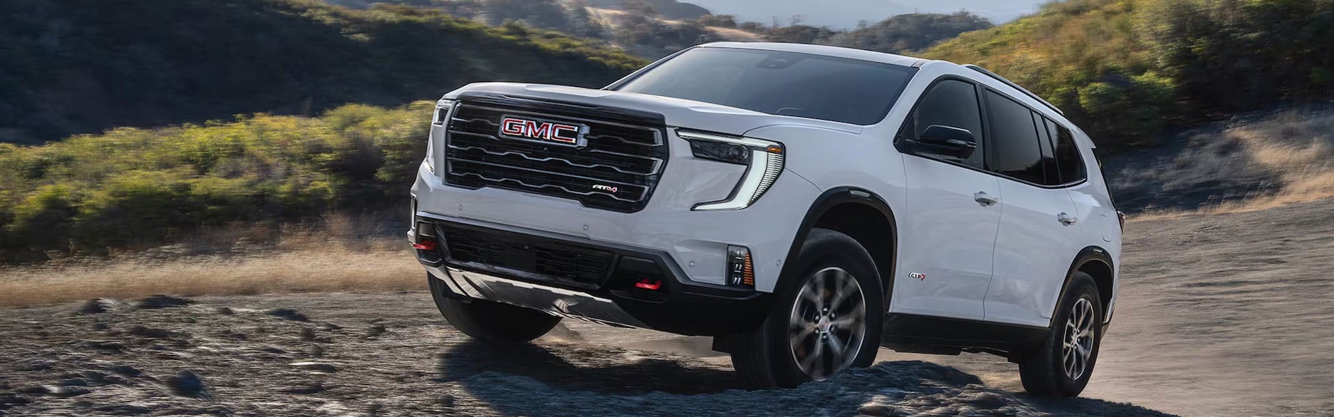 2026 GMC Acadia on dirt terrain